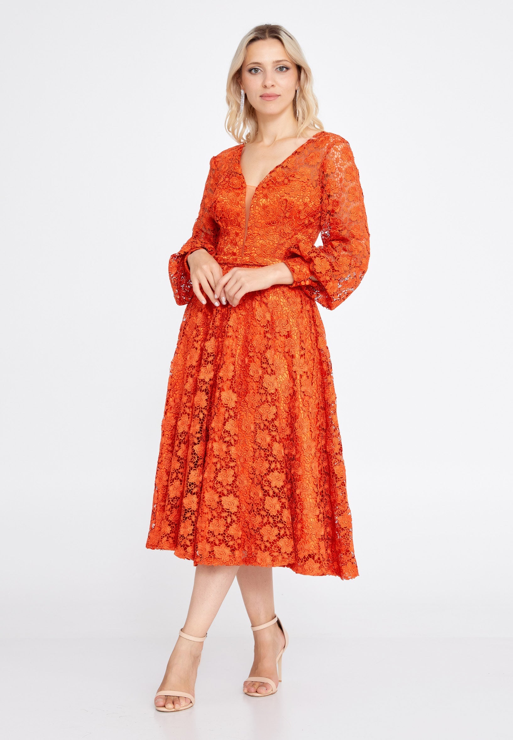 Mid-length cocktail dress with sleeves