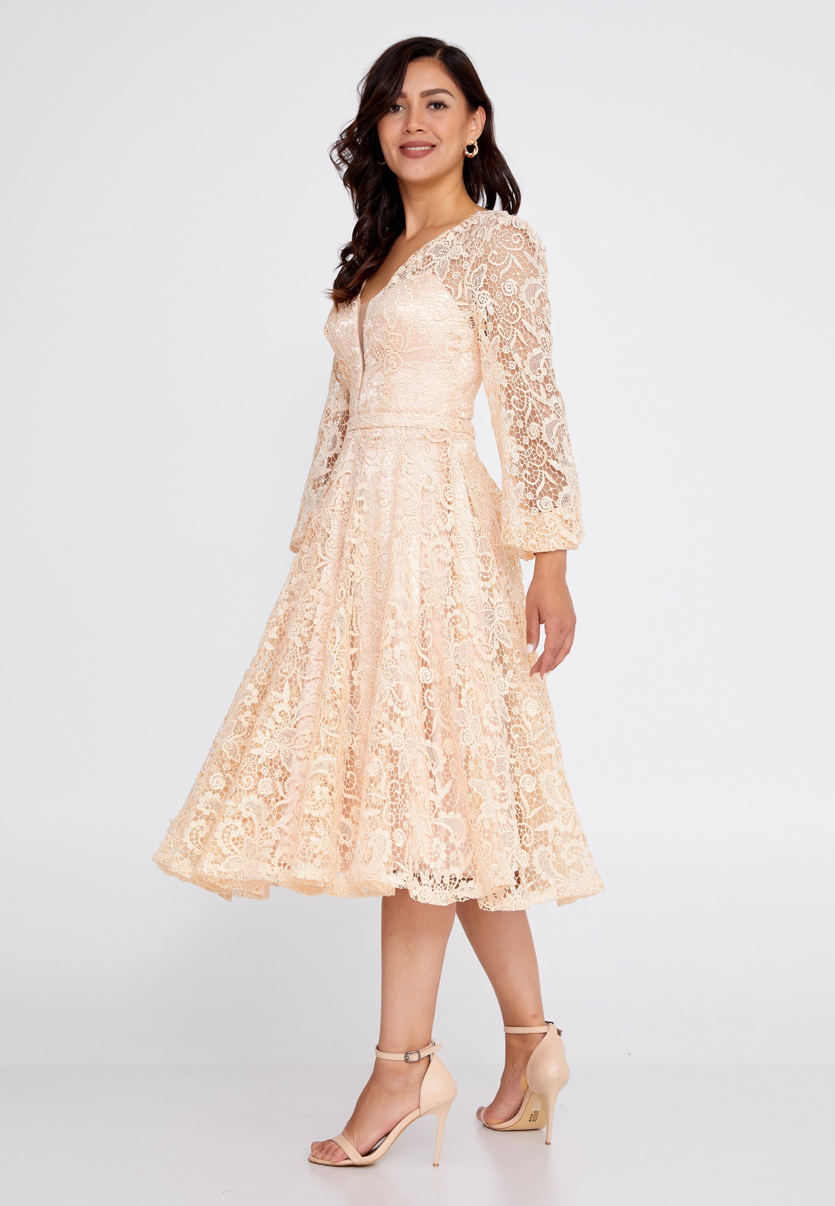 Mid-length cocktail dress with sleeves