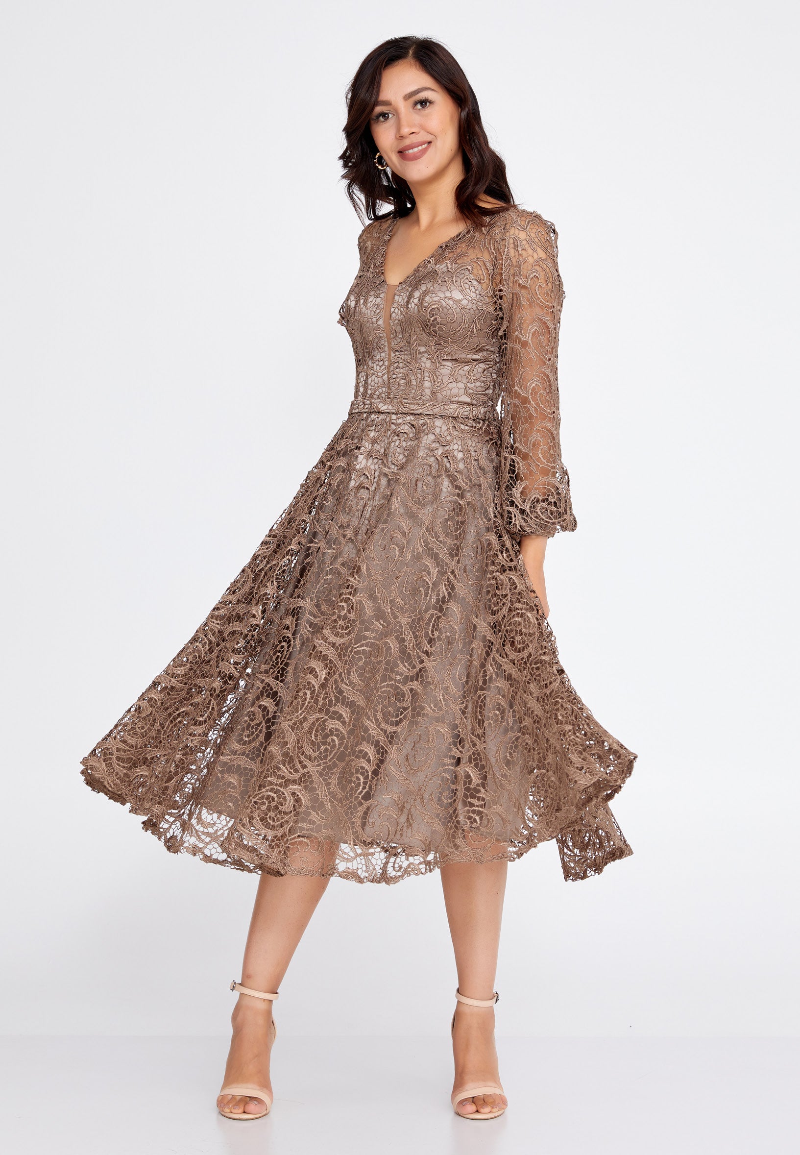 Mid-length cocktail dress with sleeves